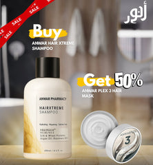 Anwar Pharmacy Hairxtreme Shampoo with a promotional offer on a blurred bathroom background